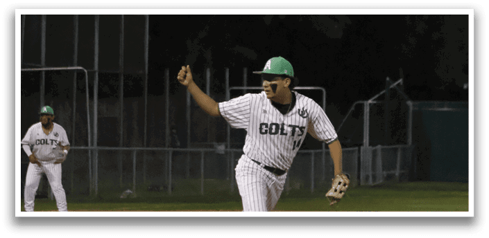 A baseball player is throwing a ball on a field. Description generated by AI