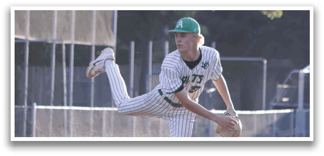 A baseball player in a green and white uniform is throwing a ball. Description generated by AI