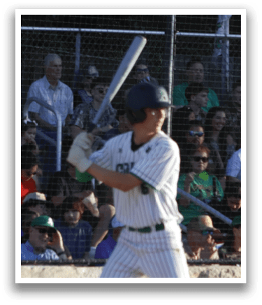 A baseball player catching a ball. Description generated by AI