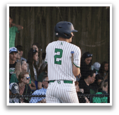 A baseball player wearing a number 2 jersey. Description generated by AI