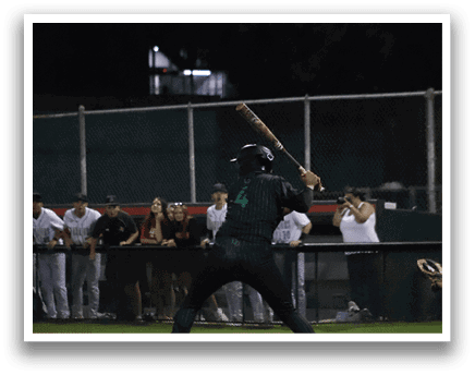 A baseball player is swinging a bat. Description generated by AI