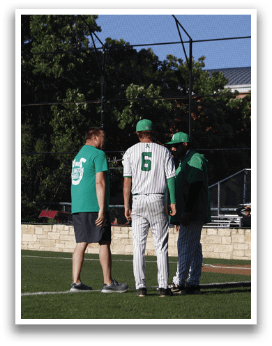 A man and woman standing on a baseball field. Description generated by AI