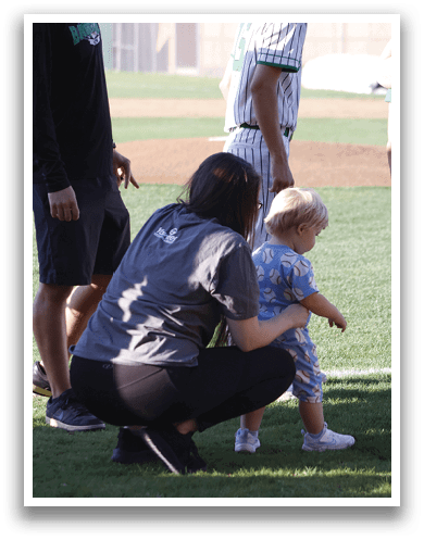A man wearing a baseball uniform. Description generated by AI