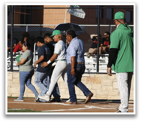 A group of baseball players standing in a line. Description generated by AI
