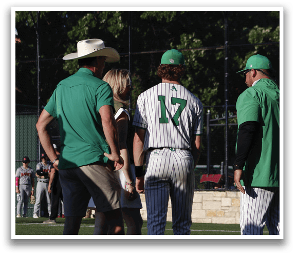 A group of baseball players standing in a line. Description generated by AI