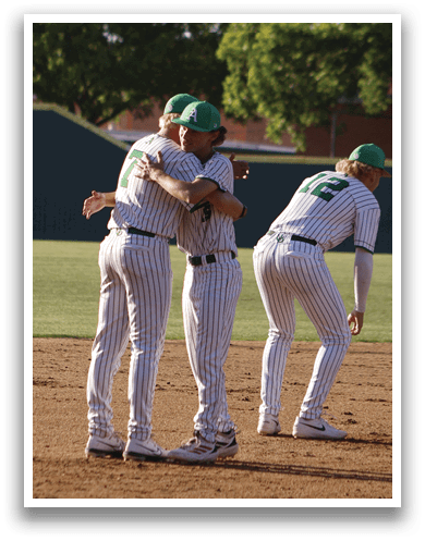 A man wearing a baseball uniform. Description generated by AI