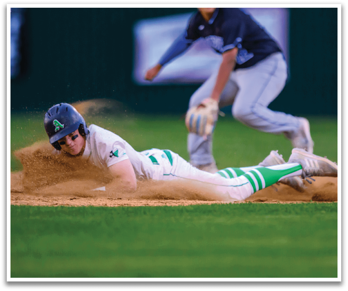 A baseball player slides into a base. Description generated by AI