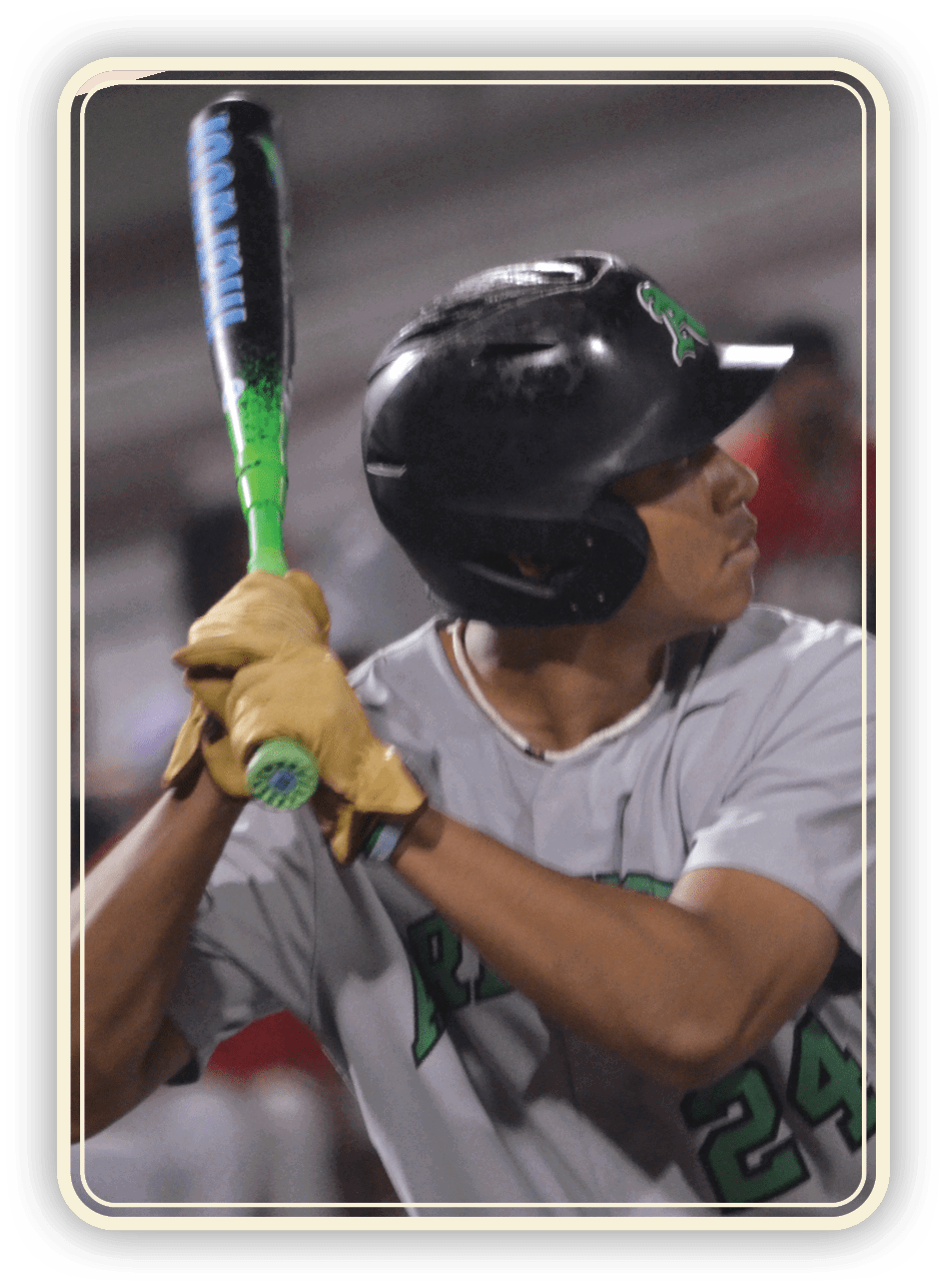 A baseball player in a grey uniform is holding a bat, preparing to swing. AI generated content