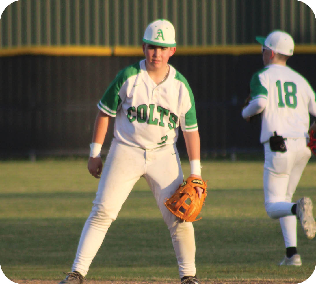 Two baseball players on a field, one wearing a white shirt and the other wearing a green and white shirt. The player in the green and white shirt is holding a baseball glove. AI generated content