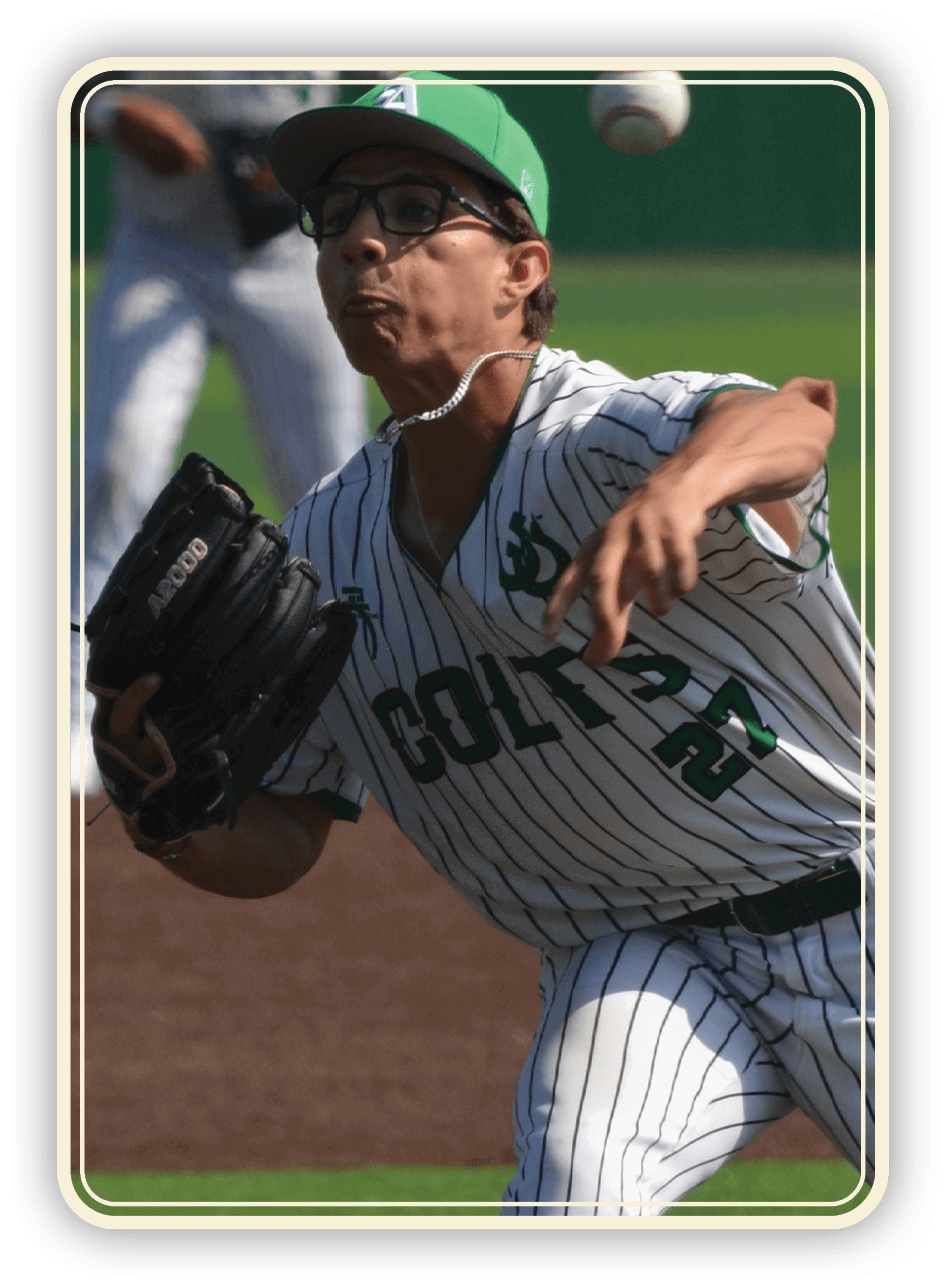 A baseball player in a green shirt and white pants is diving for a ball. AI generated content