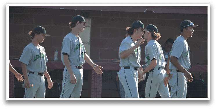 A group of baseball players wearing grey uniforms are standing on a field. AI generated content