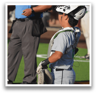 A boy wearing a baseball glove is standing on a field. AI generated content