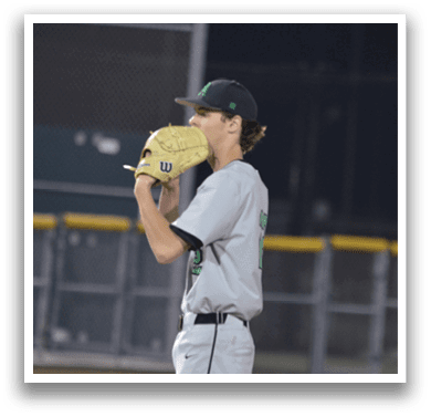 A baseball player in a white uniform is holding a baseball glove and preparing to throw the ball. AI generated content