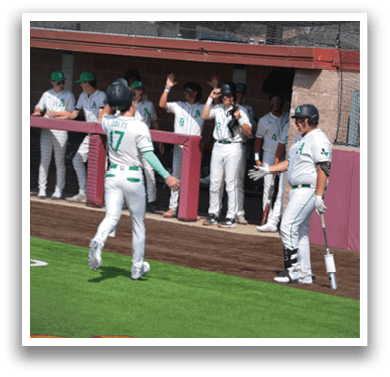 Baseball players are on the field, with some walking and others standing. A man in a blue shirt is walking towards the players, likely a coach or an official. The players are wearing baseball gloves, and some are holding baseball bats. AI generated content