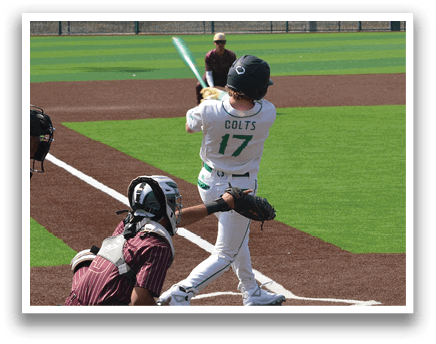 A baseball player is at bat, holding a bat and preparing to swing. AI generated content