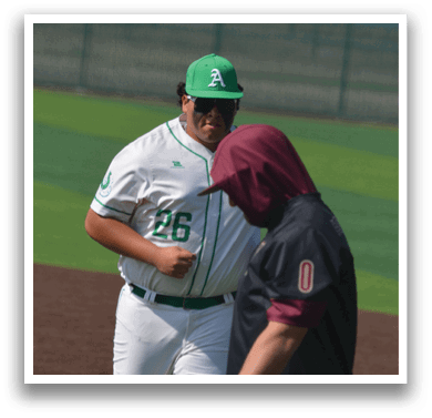 A baseball player is being checked by a coach on the field. AI generated content