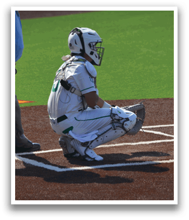 A baseball player is kneeling on the ground with his glove on. AI generated content