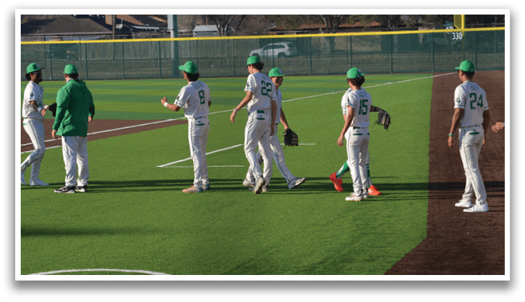 A group of baseball players wearing green hats and white uniforms are standing on a field. AI generated content