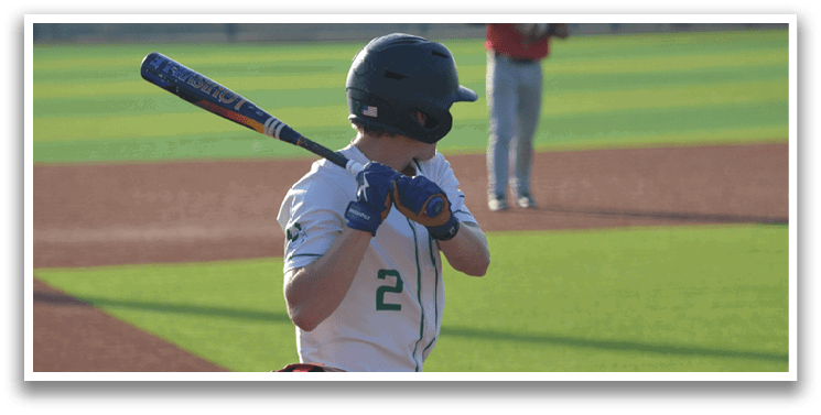 A baseball player is at bat, holding a bat and getting ready to swing. The catcher is behind him, wearing a baseball glove. AI generated content