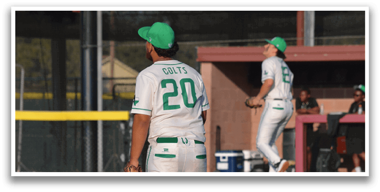 Two baseball players wearing white uniforms are walking on the field. AI generated content