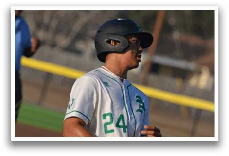 A baseball player wearing a green and white uniform is running on the field. AI generated content