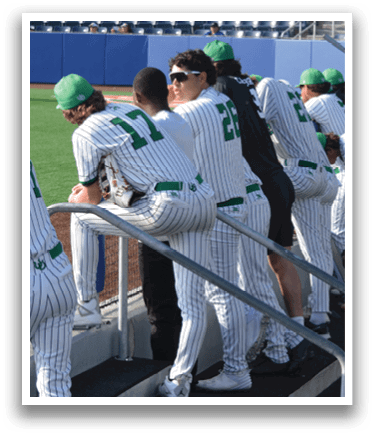Baseball players wearing green hats and white uniforms are sitting on a stairway. AI generated content