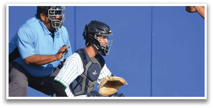 A baseball catcher is kneeling down behind a batter, ready to catch the ball. AI generated content