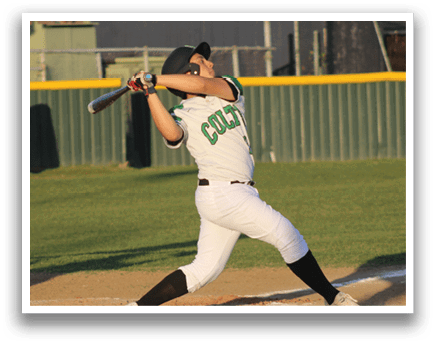 A baseball player in a white uniform is swinging a bat on a baseball field. AI generated content