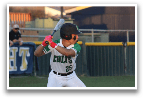 A baseball player in a white uniform is holding a bat and preparing to swing at a pitch. AI generated content