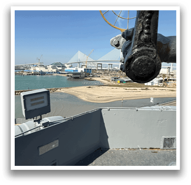 A large cannon is mounted on a boat. AI generated content