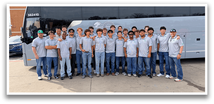 A group of young men pose for a picture in front of a bus. AI generated content