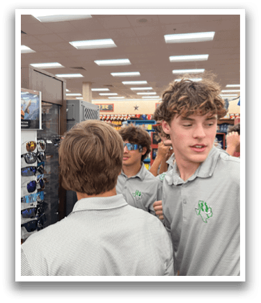 A group of young men wearing sunglasses and shirts are standing in front of a sunglass display. AI generated content