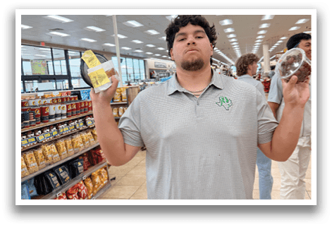 A man is holding a bottle in a grocery store. AI generated content