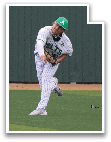 A baseball player is standing on a field, wearing a green hat and a white uniform. He is holding a baseball glove and appears to be preparing to catch a ball. AI generated content