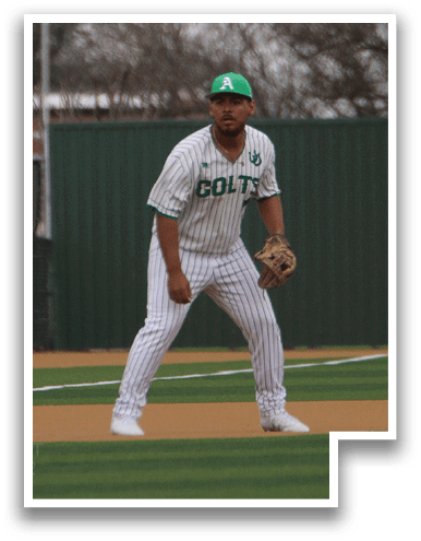 A baseball player in a white uniform is standing on the field, holding a baseball glove. AI generated content