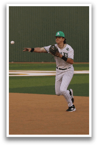 A baseball player in a green hat and white uniform is throwing a ball on a field. AI generated content