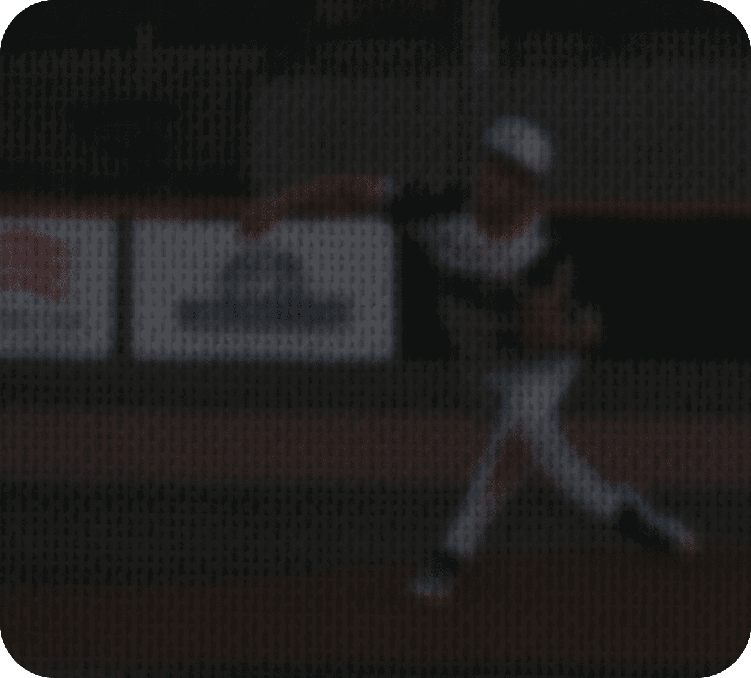 A baseball player in a green and white uniform is pitching a ball. AI generated content