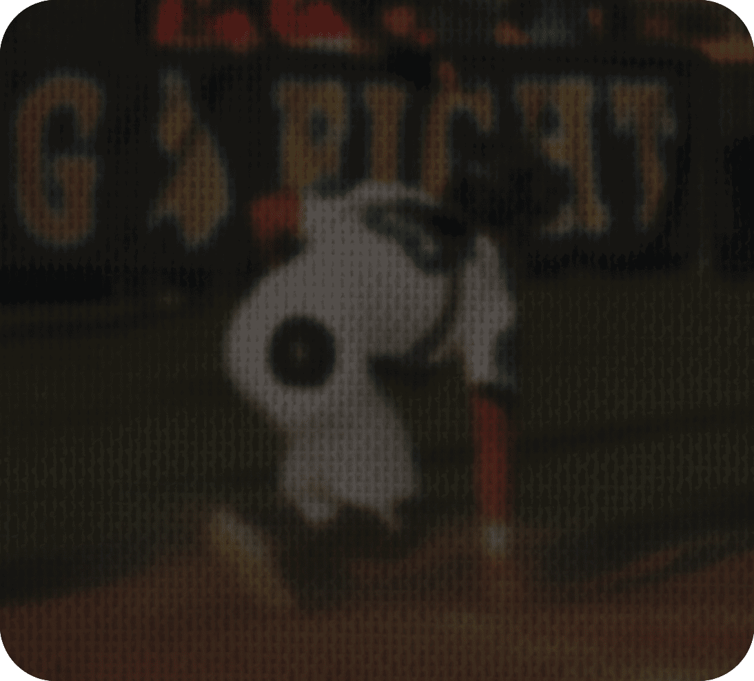 A baseball player slides into home plate, with his teammates and opponents watching. AI generated content