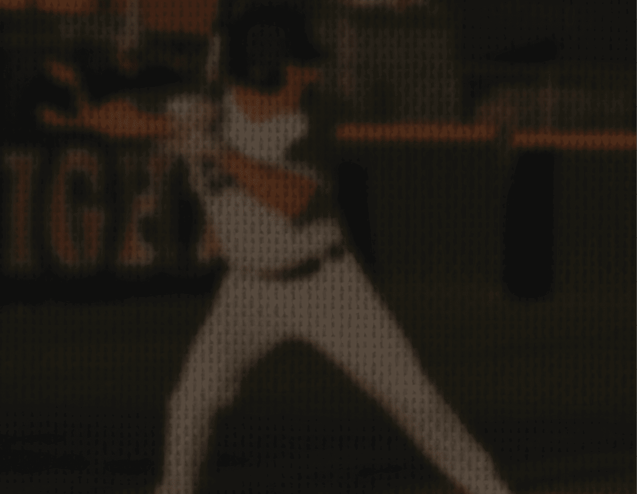 A baseball player in a white uniform is swinging a bat on a field. AI generated content