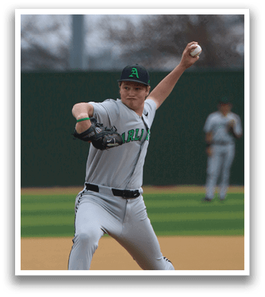 A baseball player in a grey uniform is pitching a ball on a field. AI generated content
