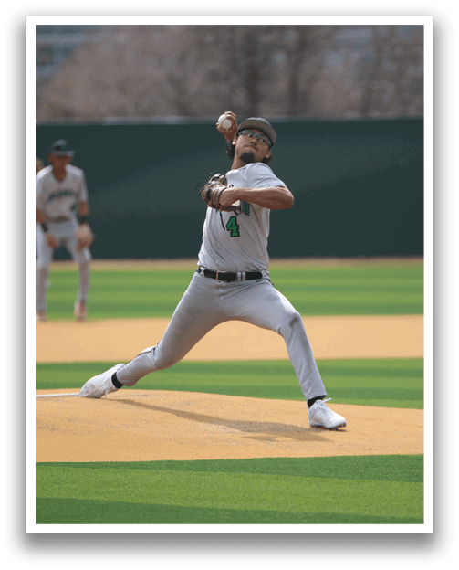 A baseball player in a white uniform is pitching a ball on a field. AI generated content