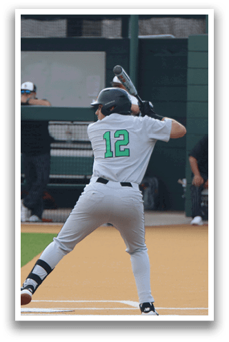A baseball player is swinging a bat on a field, with other players and a catcher nearby. AI generated content