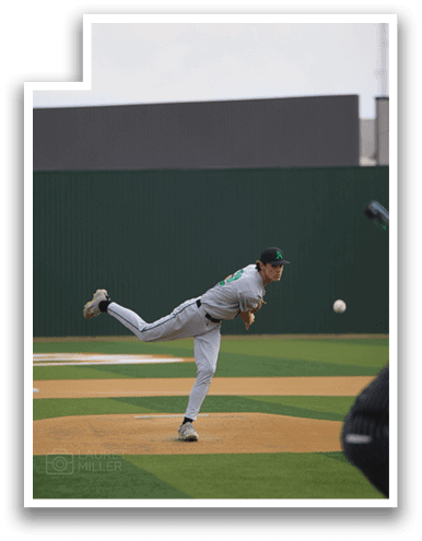 A baseball player in a grey shirt and white pants is pitching a ball on a field. AI generated content