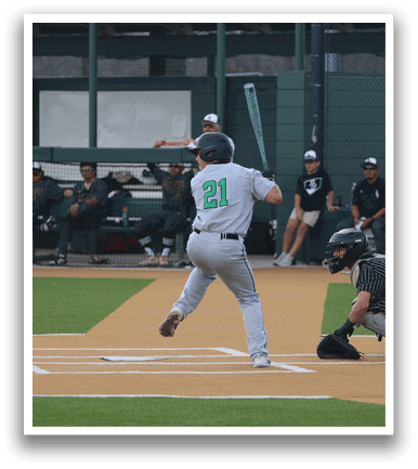 A baseball player is swinging a bat at a ball during a game. AI generated content