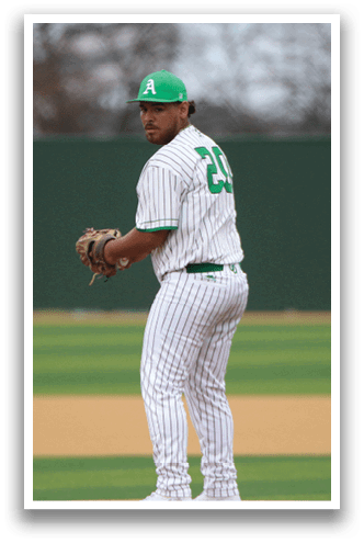 A baseball player in a green and white uniform is on the mound, preparing to throw the ball. AI generated content