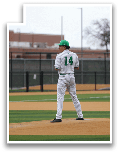 A baseball player in a green and white uniform stands on the pitcher's mound, getting ready to throw the ball. AI generated content