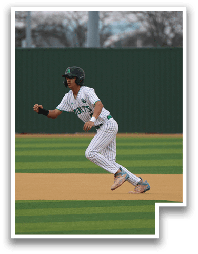 A baseball player is running on the field, wearing a green and white uniform. Two other players are watching from the sidelines. AI generated content