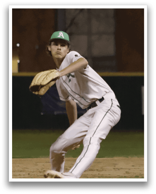 A baseball player in a grey uniform is pitching a ball on a field. AI generated content