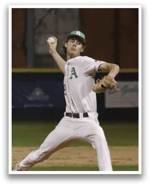 A baseball player in a white uniform is pitching a ball on a field. AI generated content