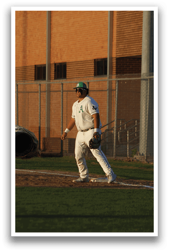 A baseball player in a white uniform is standing on a field, holding a baseball glove. AI generated content